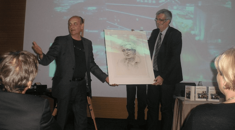 ©Copyright Sabahudin Hadžialić. Receiving a portrait of himself by the side of Slovenian artist Tadej Zugman, Ljubljana, Slovenia, 2014. During the promotion of his novel in Ljubljana.