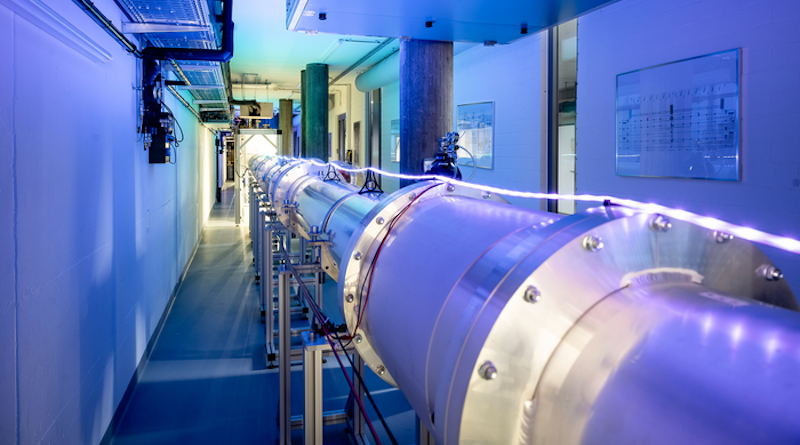 Partial section of the 30-metre-long quantum connection between two superconducting circuits. The vacuum tube (centre) contains a microwave waveguide that is cooled to around –273°C and connects the two quantum circuits. CREDIT: Image: ETH Zurich / Daniel Winkler