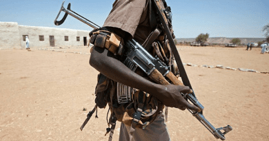 File photo of a gunman in Darfur, Sudan. Photo Credit: Albert González Farran / UNAMID