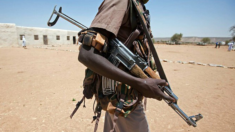 File photo of a gunman in Darfur, Sudan. Photo Credit: Albert González Farran / UNAMID