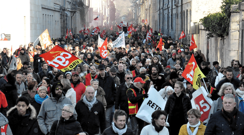 File photo of protests in France against pension reform. Photo Credit: Toufik-de-Planoise, Wikipedia Commons