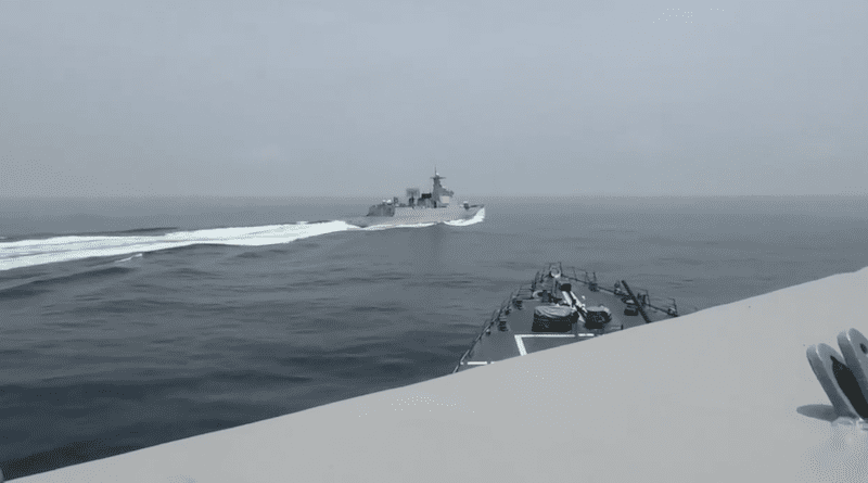 The Arleigh Burke-class guided-missile destroyer USS Chung-Hoon (DDG 93) observes PLA(N) LUYANG III DDG 132 (PRC LY 132) execute maneuvers in an unsafe manner while conducting a routine south to north Taiwan Strait transit alongside the Halifax-class frigate HMCS Montreal (FFG 336), June 3. Photo Credit: Screenshot of U.S. Navy video by Lt. j.g. Abigail Russell