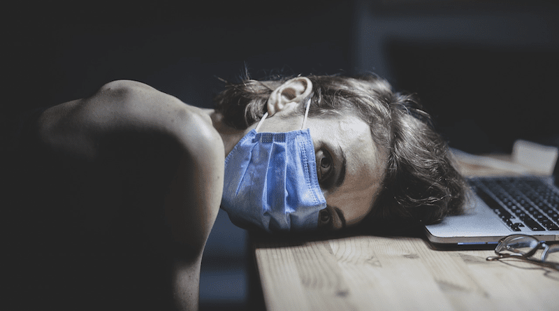 woman covid coronavirus tired mask