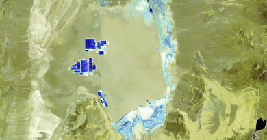 Lithium mining in Salar de Atacama in Chile. Brines from beneath the salty crust are pumped to evaporation ponds, visible as the blue rectangles in these Landsat images. Photo Credit: USGS, Earth Resources Observation and Science (EROS) Center