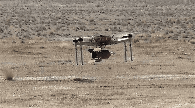 A Iranian multirotor bomber drone carries a payload. Photo Credit: Tasnim News Agency