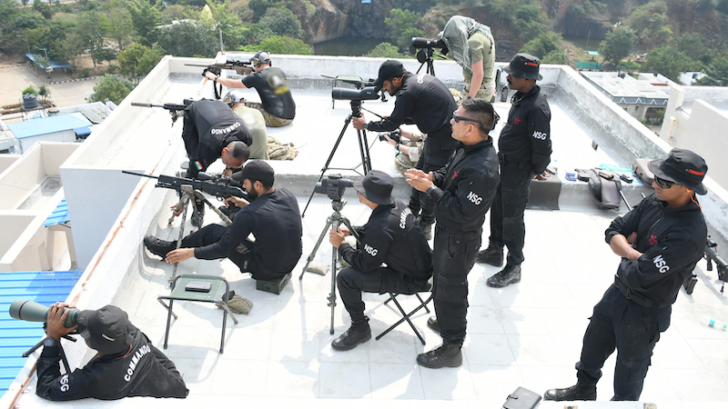 Snipers from India’s National Security Guard and Green Berets from the U.S. Army’s 1st Special Forces Group (Airborne) rehearse long-range marksmanship in an urban environment during a counterterrorism exercise in Chennai, India, Feb. 28, 2023. Photo Credit: DOD