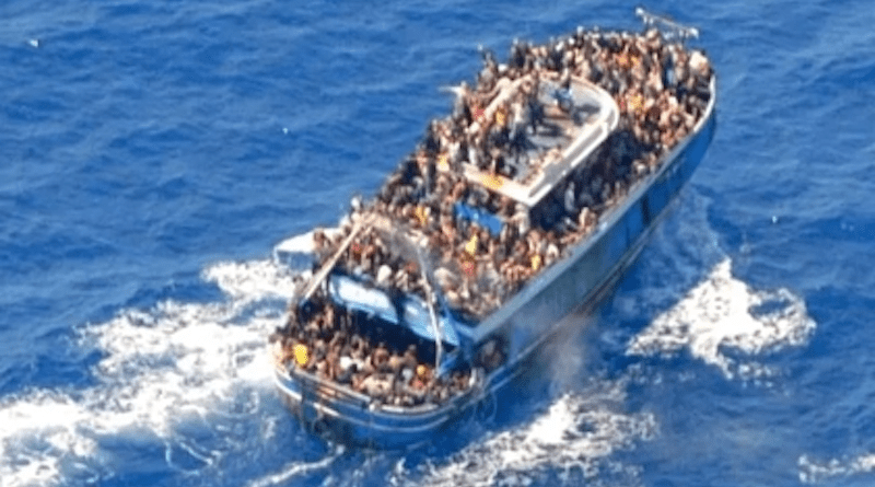 Image of the fishing boat involved in the 2023 Peloponnese migrant boat disaster, taken by the Greek coastguard hours before the capsizing. Photo Credit: Hellenic Coast Guard, Wikipedia Commons