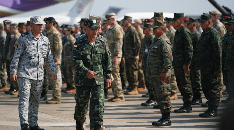 Thai Armed Forces chief Gen. Chalermpol Srisawat, (second from left) observes multinational troops after the opening ceremony for the Cobra Gold 2023 exercises at U-Tapao Naval Base in Rayong province, Thailand, Feb. 28, 2023. Photo Credit: BenarNews