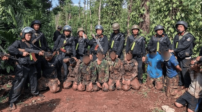Vietnamese security personnel arrest suspects in the armed attacks in Dak Lak province in this undated photo. Photo Credit: Vietnam Mobile Police High Command