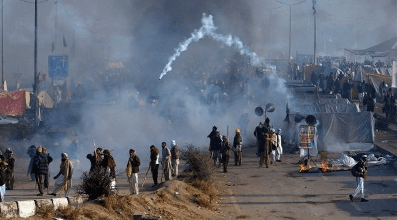 Protestors in Pakistan face off against the army. Photo Credit: Tasnim News Agency