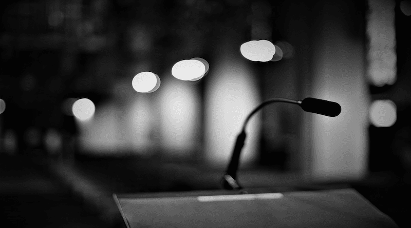 debate podium speech microphone