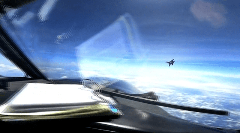In this screen grab from video released by the U.S. military, a Chinese J-16 fighter jet carries out a maneuver that the U.S. military said was “unnecessarily aggressive” near an American reconnaissance plane flying above contested waters in the South China Sea, May 26, 2023. U.S military handout