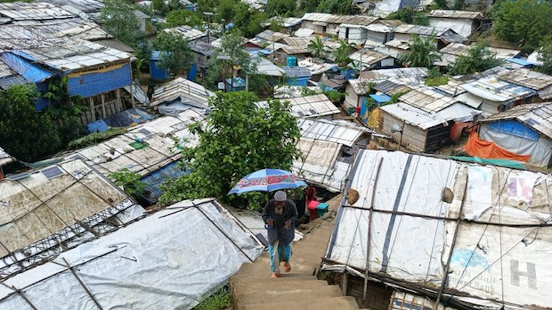 A Rohingya man walks inside Balukhali refugee camp in Cox’s Bazar. Photo Credit: BenarNews