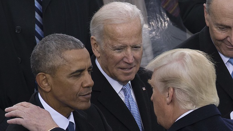 File photo of President Donald J. Trump with the 44th President of the United States, Barack H. Obama and Vice President Joe Biden during the 58th Presidential Inauguration at the U.S. Capitol Building, Washington, D.C., Jan. 20, 2017. Photo Credit: DoD photo by U.S. Marine Corps Lance Cpl. Cristian L. Ricardo