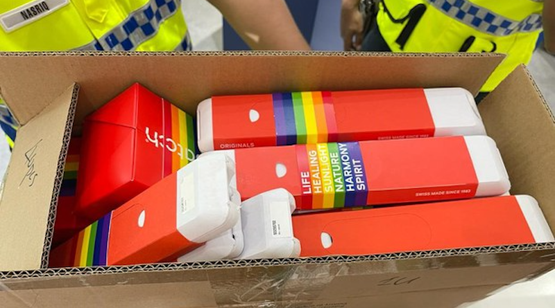 Members of Malaysia’s Ministry of Home Affairs enforcement unit with 25 rainbow-colored watches confiscated from Swatch’s Pride Collection at One Utama Shopping Center, Kuala Lumpur, May 13, 2023. Photo Credit: Handout/Swatch Malaysia