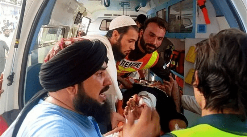 A patient being treated after a suicide bomber detonated explosives at a political rally of the conservative Jamiat Ulema-e-Islam (JUI-F) party in Bajaur district, Pakistan. Photo Credit: Tasnim News Agency