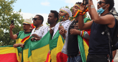 men Ethiopia protest flag demonstration