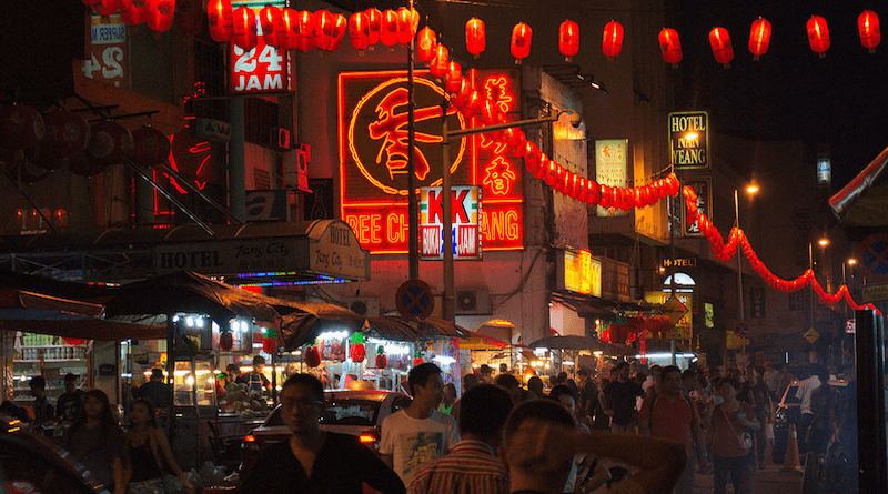Petaling Street, a Chinatown in Malaysia's capital of Kuala Lumpur, at night. Photo Credit: Marcin Pieluzek, Wikipedia Commons
