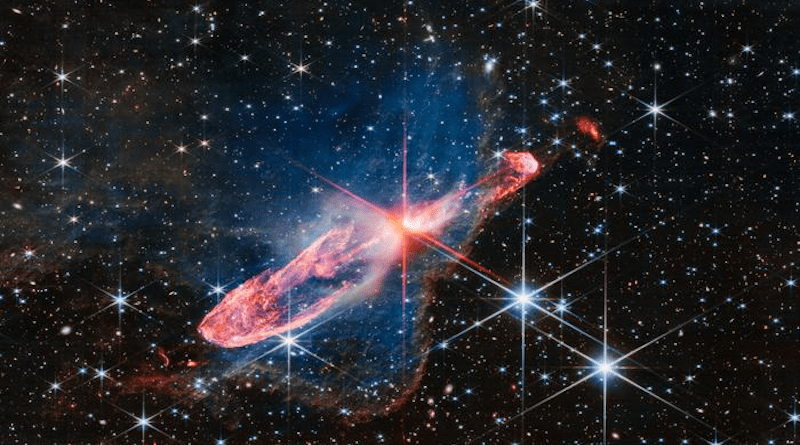 NASA’s James Webb Space Telescope has captured a tightly bound pair of actively forming stars, known as Herbig-Haro 46/47, in high-resolution near-infrared light. Look for them at the center of the red diffraction spikes, appearing as an orange-white splotch. Herbig-Haro 46/47 is an important object to study because it is relatively young – only a few thousand years old. Star systems take millions of years to fully form. Targets like this give researchers insight into how much mass stars gather over time, potentially allowing them to model how our own Sun, which is a low-mass star, formed – along with its planetary system. Credits: Image: NASA, ESA, CSA. Image Processing: Joseph DePasquale (STScI)