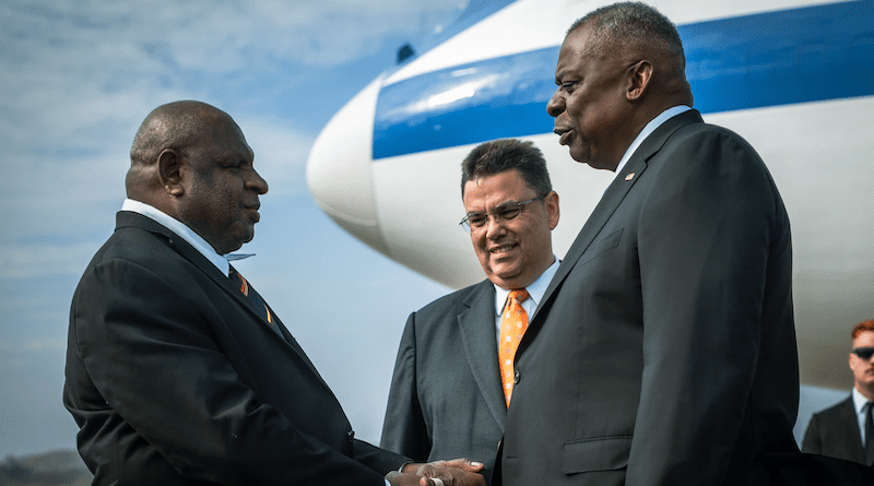 Secretary of Defense Lloyd J. Austin III greets Joe Zadrozny (center), Chargé d’Affaires, U.S. Embassy Papua New Guinea and Elias Wohengu, Deputy Chief of Mission, in Port Moresby, Papua New Guinea, July 27, 2023. Photo Credit: Chad J. McNeeley, DOD