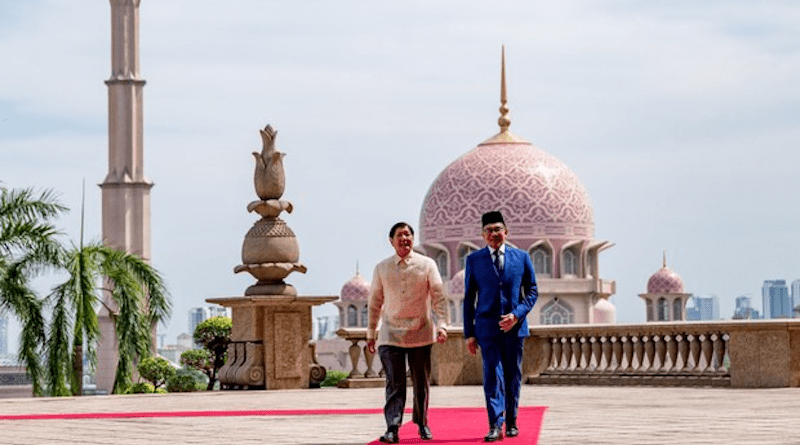 Malaysian Prime Minister Anwar Ibrahim (left) walks with Philippine President Ferdinand Marcos Jr. at the Perdana Putra Building complex with the Putrajaya Mosque in the background, in Putrajaya, Malaysia, July 26, 2023. Photo Credit: Courtesy Prime Minister’s Office