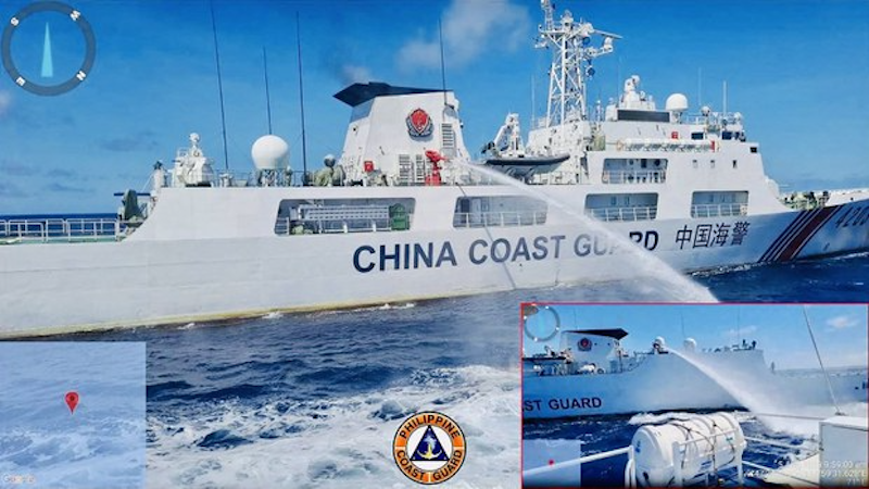 Handout imagery shows a China Coast Guard ship releasing water cannon on a Philippine Coast Guard ship near Second Thomas Shoal during a re-supply mission on August 5, 2023. (Philippine Coast Guard Handout)