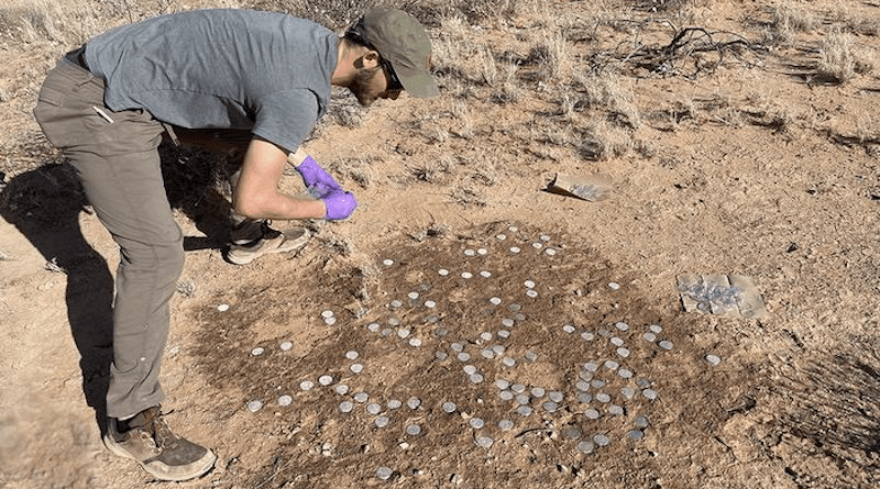 Penn State graduate student Ryan Trexler collects cores of biocrust from the field before bringing them back to the lab to study. CREDIT: Penn State