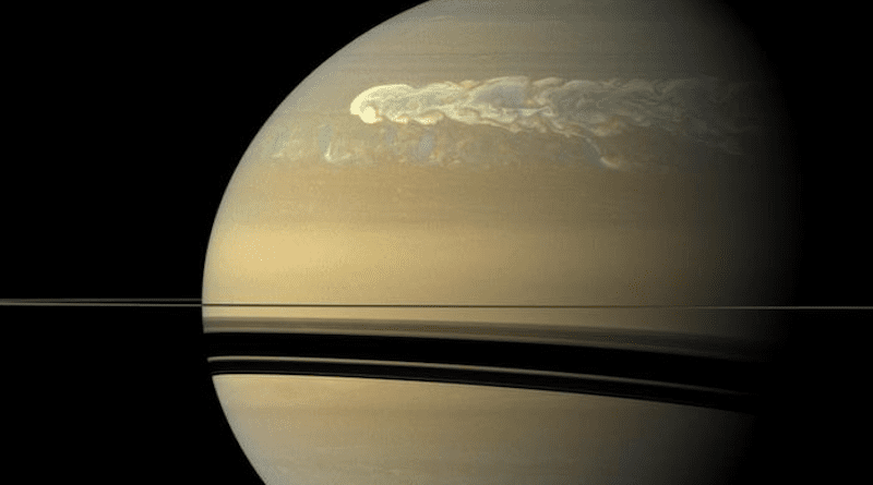 A huge storm dominates the rather featureless surface of Saturn in an image taken by the Cassini spacecraft on Feb. 25, 2011, about 12 weeks after the powerful storm was first detected in the planet's northern hemisphere. The megastorm is seen overtaking itself as it encircles the entire planet. Astronomers have found deep in the atmosphere the aftereffects of megastorms that occurred hundreds of years ago. The dark stripes are the shadows of Saturn's rings. CREDIT: NASA/JPL/Space Science Institute