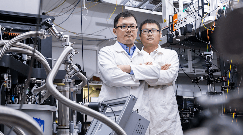 Research fellow Dr Wang Naizhou (left) and Assoc Prof Gao Weibo from Nanyang Technological University, Singapore with the cryogenic superconducting magnet used to conduct their experiments on antiferromagnets. Dr Wang is the first author of the research paper and Assoc Prof Gao led the team of scientists on the research. (Credit: NTU Singapore)