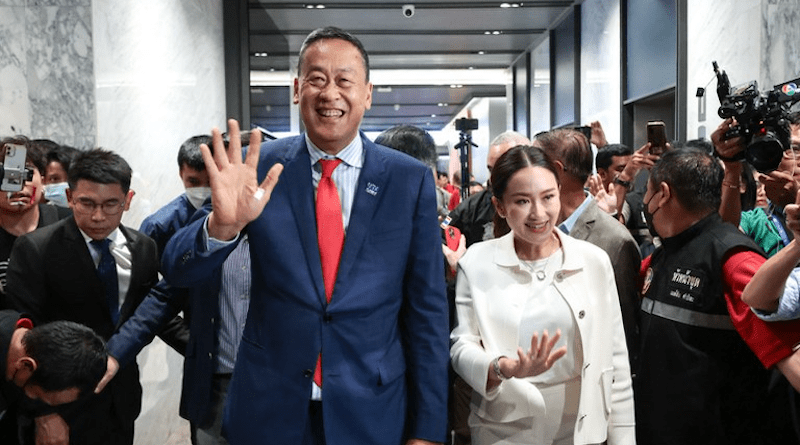 Srettha Thavisin (left), joined by Paetongtarn Shinawatra, the daughter of Thaskin Shinawatra, greets reporters at Pheu Thai headquarters after receiving enough votes to serve as Thailand’s prime minister, Aug. 22, 2023. [Surin Pinsuwan/BenarNews]