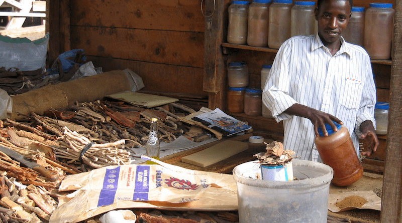 A local herbal shop keeper displaying his assortment of traditional medicines in Arusha, Tanzania. The traditional medicine market is projected to reach US$115 billion by the end of this year. Copyright: neiljs (CC BY 2.0)