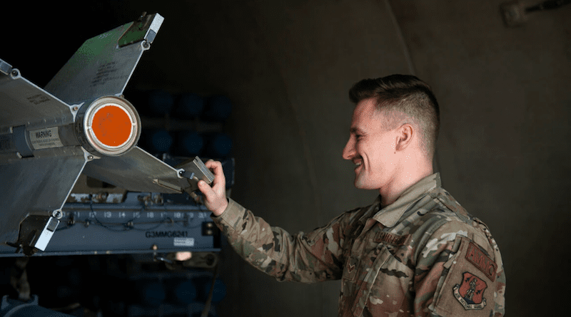 U.S. Air Force Senior Airman Cannon Ritzler, a munitions systems specialist with the Ohio National Guard, inspects an Air Intercept Missile, also known as an AIM-9M Sidewinder missile. Photo Credit: Air Force Senior Master Sgt. Beth Holliker, Air National Guard