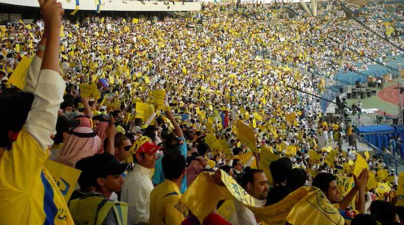 Al-Nasr football fans in King Fahd Stadium, Saudi Arabia. Photo Credit: alobayd, Wikipedia Commons