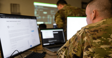 A soldier assigned to a Mississippi Army National Guard cyber defense team monitors cyberattacks during Exercise Southern Strike at Camp Shelby, Miss., April 21, 2023. Photo Credit: DOD