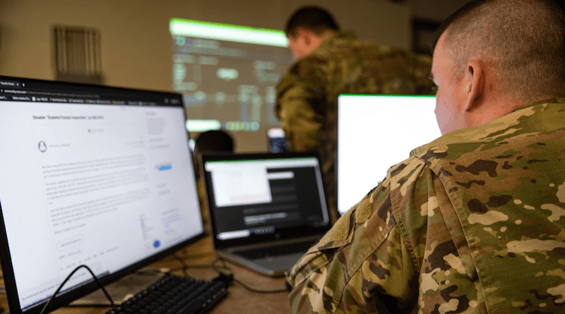A soldier assigned to a Mississippi Army National Guard cyber defense team monitors cyberattacks during Exercise Southern Strike at Camp Shelby, Miss., April 21, 2023. Photo Credit: DOD