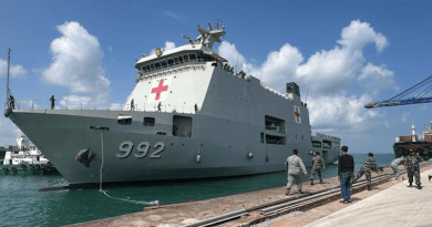 Indonesian Navy personnel prepare the hospital ship Dr. Radjiman Wedyodiningrat, to be used in the first joint drill by the Association of Southeast Asian Nations’ member-states in Batam, Indonesia. [Handout/Indonesian Military Information Center]