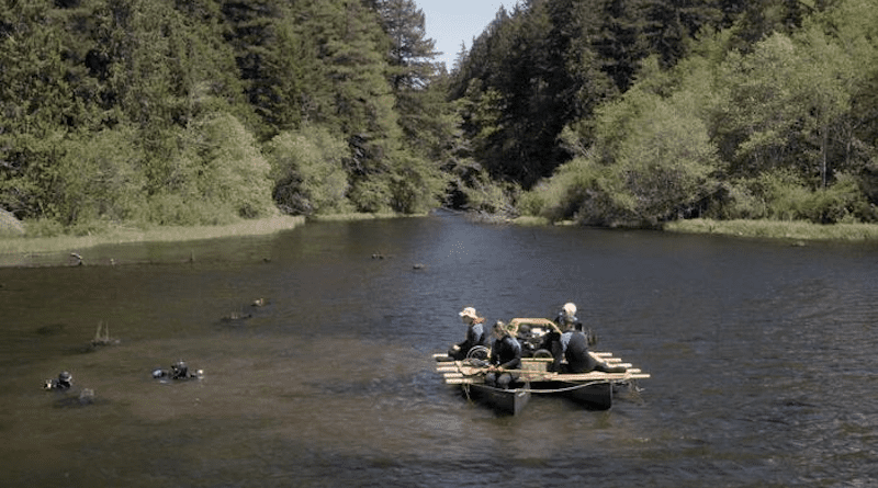 Price Lake, in the eastern Olympic Mountains, formed when the Saddle Mountain fault impounded a stream and flooded the forest. Lead author Bryan Black and his team of divers collected the samples using an underwater hydraulic chainsaw. CREDIT: Bryan Black