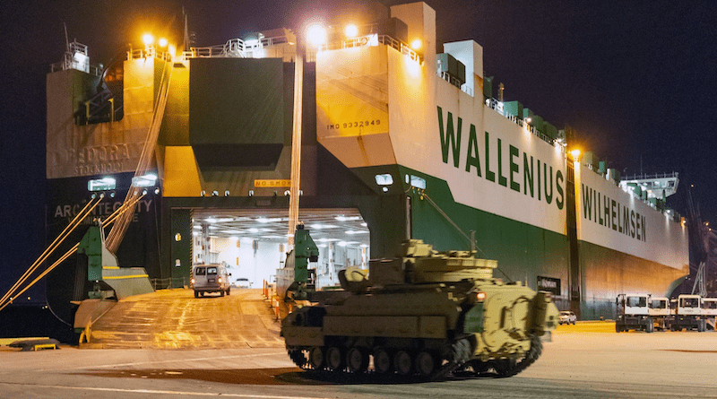 A Bradley fighting vehicle is loaded onto the ARC Integrity vehicle carrier at the Transportation Core Dock in North Charleston, S.C. Photo Credit: Oz Suguitan, Transportation Command