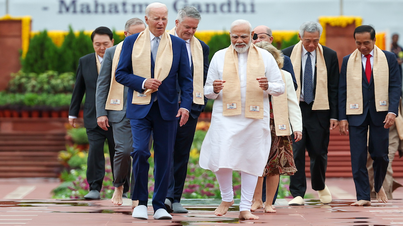 US President Joe Biden with India's PM Narendra Modi and G20 leaders as they arrive at the Samadhi of Mahatma Gandhi at Rajghat, in New Delhi on September 10, 2023. Photo Credit: India PM Office