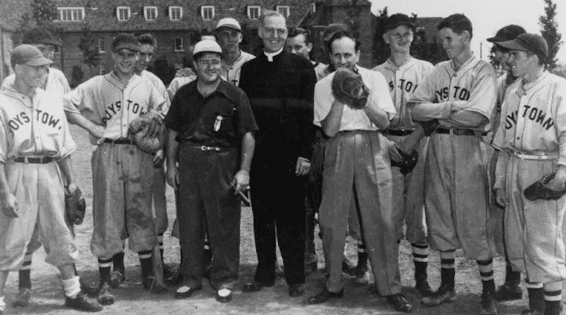 Father Edward Flanagan with baseball players at Boys Town. | Credit: Photo courtesy of the Father Flanagan League