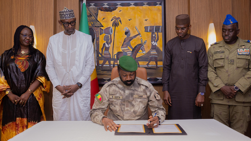 Mali's Colonel Assimi Goïta signs the Liptako-Gourma Charter which created the Alliance of Sahel States (AES). Photo Credit: Colonel Assimi Goïta, X