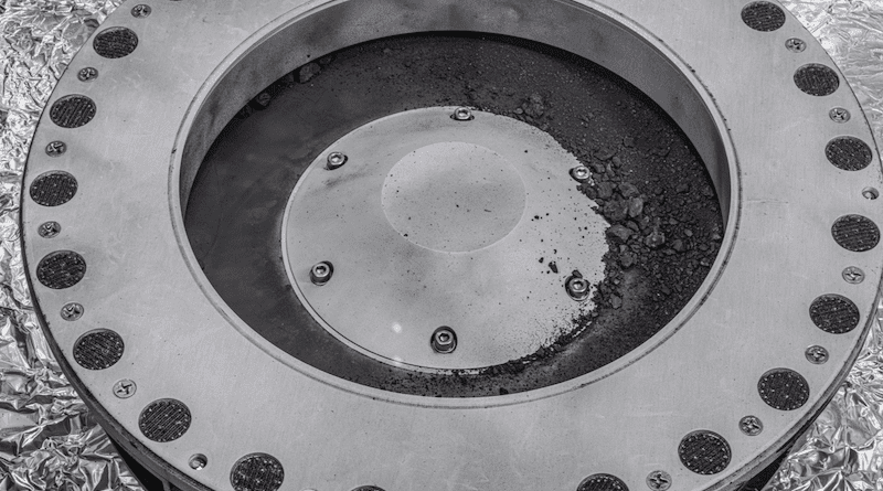 A view of the outside of the OSIRIS-REx sample collector. Sample material from asteroid Bennu can be seen on the middle right. Scientists have found evidence of both carbon and water in initial analysis of this material. The bulk of the sample is located inside. Photo: NASA/Erika Blumenfeld & Joseph Aebersold