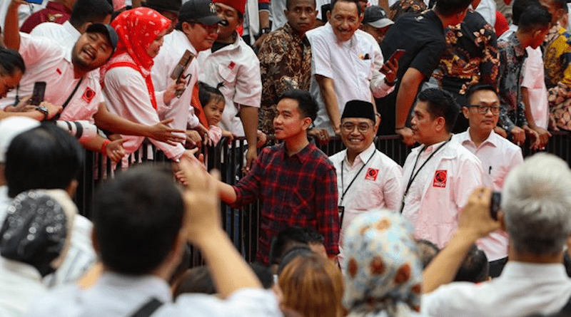 Gibran Rakabuming Raka (center), the mayor of Solo (Surakarta) and eldest son of President Joko “Jokowi” Widodo, greets Pro-Jokowi volunteers at the Projo National Meeting at Gelora Bung Karno Stadium in Jakarta, Oct.14, 2023. Photo Credit: Eko Siswono Toyudho/BenarNews