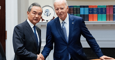 China's Foreign Minister Wang Yi with US President Joe Biden. Photo Credit: China's Foreign Ministry