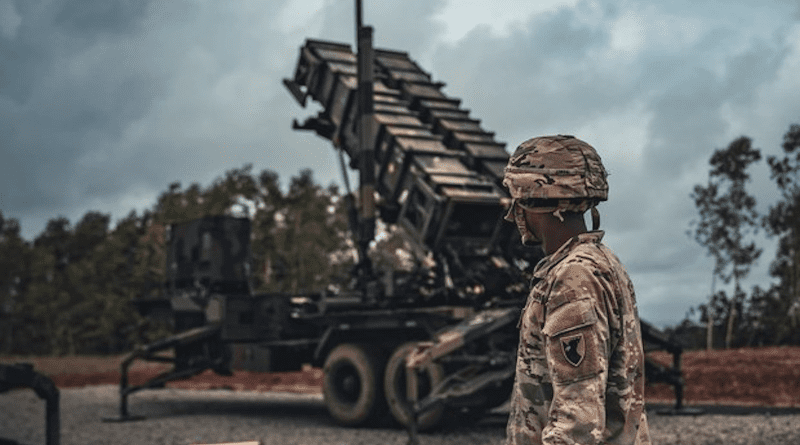 A Patriot missile launching-station operator stands next to a recently fired MIM-104 Patriot launcher at Roman Tmetuchl International Airport, Palau on July 17, 2023. Photo Credit: Trevor Wild/U.S. Army