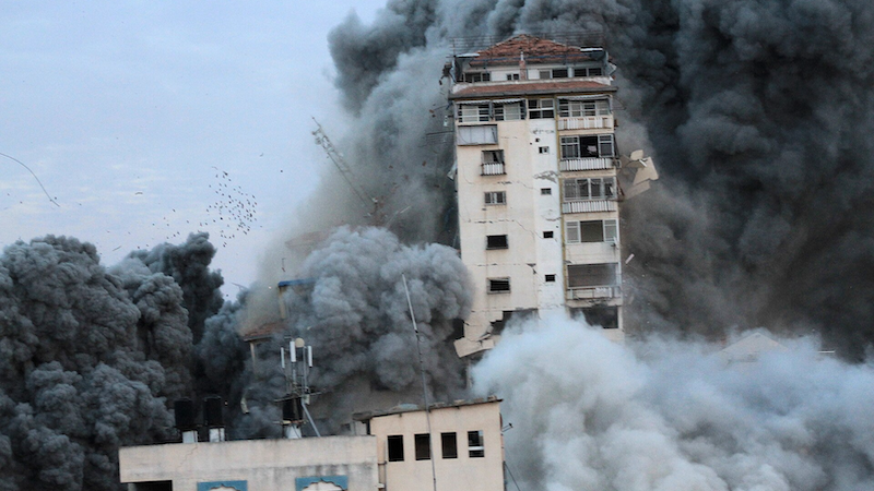 Destruction of the Palestine Tower in Gaza following an Israeli airstrike. Photo Credit: Palestinian News & Information Agency (Wafa), Wikipedia Commons