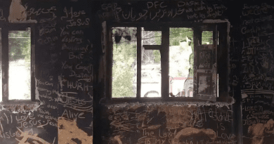 Messages for Christians are written on the ash-covered wall of the Salvation Army Church in Jaranwala, a Christian settlement in Pakistan's Punjab province, where at least 19 churches were destroyed on Aug. 16 during an anti-Christian violence. (Photo: Kamran Chaudhry)
