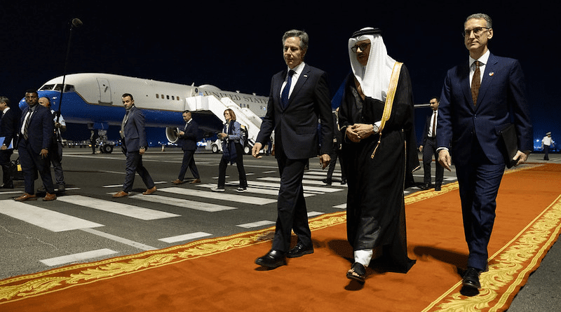 Secretary of State Antony J. Blinken walks with Bahrain's Foreign Minister Abdullatif bin Rashid al-Zayani as he arrives in Manama, Bahrain, October 13, 2023, from Qatar. At right is U.S. Ambassador to Bahrain Steven C. Brody. [State Department photo by Chuck Kennedy/Public Domain]