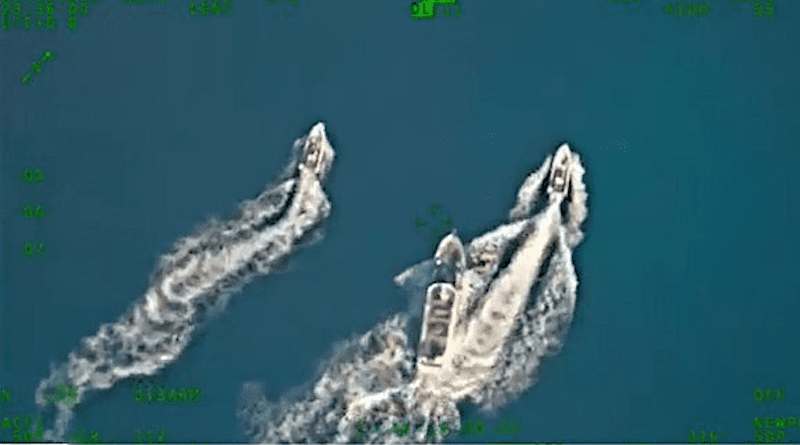 A large Chinese Coast Guard ship (center) maneuvers against two smaller Philippine supply boats near Second Thomas Shoal in the South China Sea, Nov. 10, 2023. [Screengrab from the Philippines’ Daily Tribune]