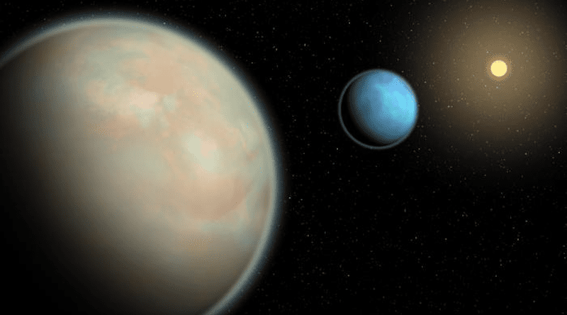 An illustration of two water-rich exoplanets with hazy atmospheres. CREDIT: Roberto Molar Candanosa/Johns Hopkins University.